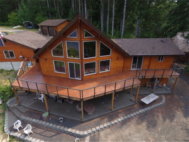 View more about Beachfront Home With Seamless Roof Deck